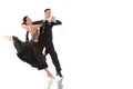 Ballroom dance couple in a dance pose isolated on white Royalty Free Stock Photo