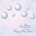 Balls with bows on a background with snowflakes Text Happy New Year and Merry Christmas Winter background Royalty Free Stock Photo