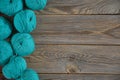 Balls of bright woolen yarn on old wood background. With Copy Space Royalty Free Stock Photo