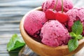 Balls of cherry ice cream in a bowl close up. Royalty Free Stock Photo