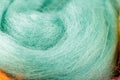 Balls of coiled natural wool for yarn, sewing, felting and making handmade crafts Royalty Free Stock Photo