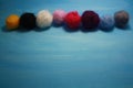 Balls of colored wool for making beads Royalty Free Stock Photo