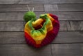 Balls of colored yarn.The process of knitting caps.