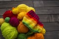 Balls of colored yarn.The process of knitting caps.
