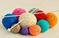 Balls of colorful yarn on white background. Royalty Free Stock Photo