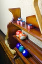 Balls for a game of pool billiards on shelves. Billiard sport concept. American pool billiard. Royalty Free Stock Photo