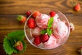 Balls of homemade strawberry ice cream in a bowl Royalty Free Stock Photo