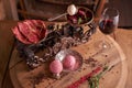 Balls of ice cream from beets and meat in an old ice-cream bowl on the background of steaks seasoned beef on vintage scales