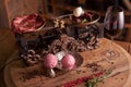 Balls of ice cream from beets and meat in an old ice-cream bowl on the background of steaks seasoned beef on vintage scales