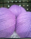 Balls of lilac yarn closeup. The texture of  threads for knitting. Yarn purple violet background Royalty Free Stock Photo