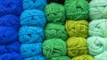 Balls of multi-colored yarn closeup. Concept of needlework, knitting, handmade, hobby