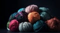 Balls of multicolored wool stacked on a dark background, different types of wool Royalty Free Stock Photo