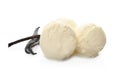Balls of tasty vanilla ice cream and pods Royalty Free Stock Photo
