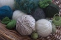 Balls of wool in basket - mostly greens Royalty Free Stock Photo