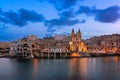 Balluta Bay and Church of Our Lady of Mount Carmel in the Evening, Saint Julian, Malta Royalty Free Stock Photo