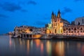 Balluta Bay and Church of Our Lady of Mount Carmel in the Evening, Saint Julien, Malta Royalty Free Stock Photo