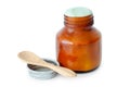 A balm jar full of medicated ointment and spoon. Royalty Free Stock Photo