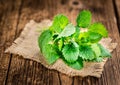 Balm selective focus on vintage wooden background Royalty Free Stock Photo