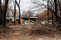 Australian bushfire aftermath: Burnt and damaged property with Hazard Identification Notice