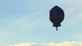 Colorful Hot Air Balloon Against A Beautiful Cloudy Blue Sky - Daytime Royalty Free Stock Photo