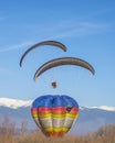 Baloon gliders moountain in the winter Royalty Free Stock Photo