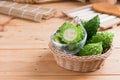 Balsam apple, Balsam pear, Bitter cucumber , Bitter gourd , Stuffed bitter gourd, karela on wood background Royalty Free Stock Photo