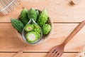 Balsam apple, Balsam pear, Bitter cucumber , Bitter gourd , Stuffed bitter gourd, karela on wood background Royalty Free Stock Photo