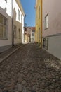 Narrow cobbled street in Tallinn.