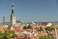 St Olaf`s Church and rooftops in old town Tallinn Royalty Free Stock Photo