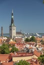 St Olaf`s Church and rooftops in old town Tallinn Royalty Free Stock Photo