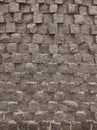 Baltic granite of square shape of each dark-colored element in the form of a vertical masonry pattern Royalty Free Stock Photo