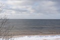 Baltic Sea beach is snowy white in winter