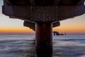 Baltic sea at beautiful sunset in Miedzyzdroje beach. Polish baltic coast. Famous city among the tourist. Pier at sunset Royalty Free Stock Photo