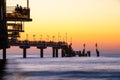 Baltic sea at beautiful sunset in Miedzyzdroje beach. Polish baltic coast. Famous city among the tourist. Pier at sunset Royalty Free Stock Photo