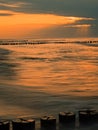 Baltic Sea with breakwaters at sunset Royalty Free Stock Photo