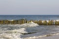 Baltic Sea coast and Wooden groyne seen there