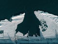 Baltic sea with frozen sea coast. Ice blocks and formations floating in the sea. Drone shot. winter landscape Royalty Free Stock Photo