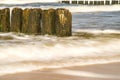 Baltic Sea with groins and surf in longtime exposure