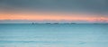 Baltic Sea with ships on horizon at sunset, Gdansk. Poland Royalty Free Stock Photo