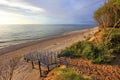 Baltic Sea shore and beach during colorful sunset in Rowy, Pomerania, Poland Royalty Free Stock Photo