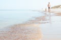 Baltic sea shore, father and son