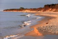 Baltic Sea shore line and beach in Rowy, Poland during sunset