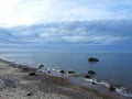 Baltic sea, stones and beautiful cloudy sky, Lithuania