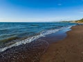 Baltic sea, waves and blue sky in sunny summer day Royalty Free Stock Photo