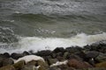 Baltic sea waves smashing in to the shore rocks