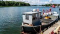 A fishing boat standing by the shore in the bay