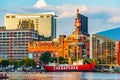 Baltimore, Maryland, US - September 4, 2019 View of Baltimore Harbor with USCG Lightship Chesapeake and office buildings Royalty Free Stock Photo