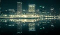 Baltimore skyline and docks reflecting in the water at night Royalty Free Stock Photo