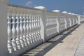 Baluster beach. White columns overlooking the sea. View of white pillars and horizont on blue sea and the sky in the Royalty Free Stock Photo