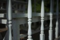 Balusters on the veranda. Fencing on the veranda. Fence in the old style.